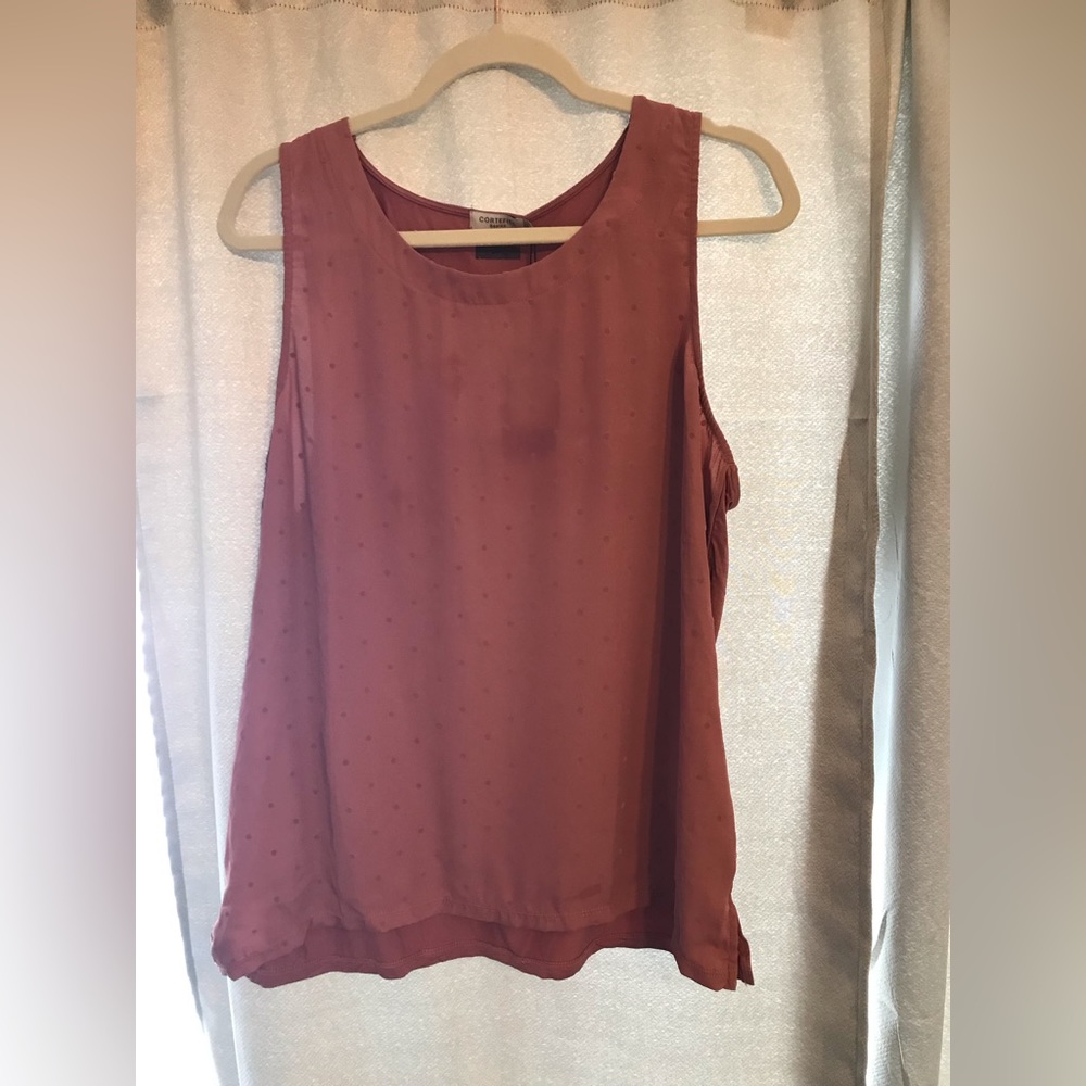 Sleeveless pink blouse